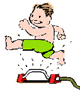 Boy jumping over sprinkler